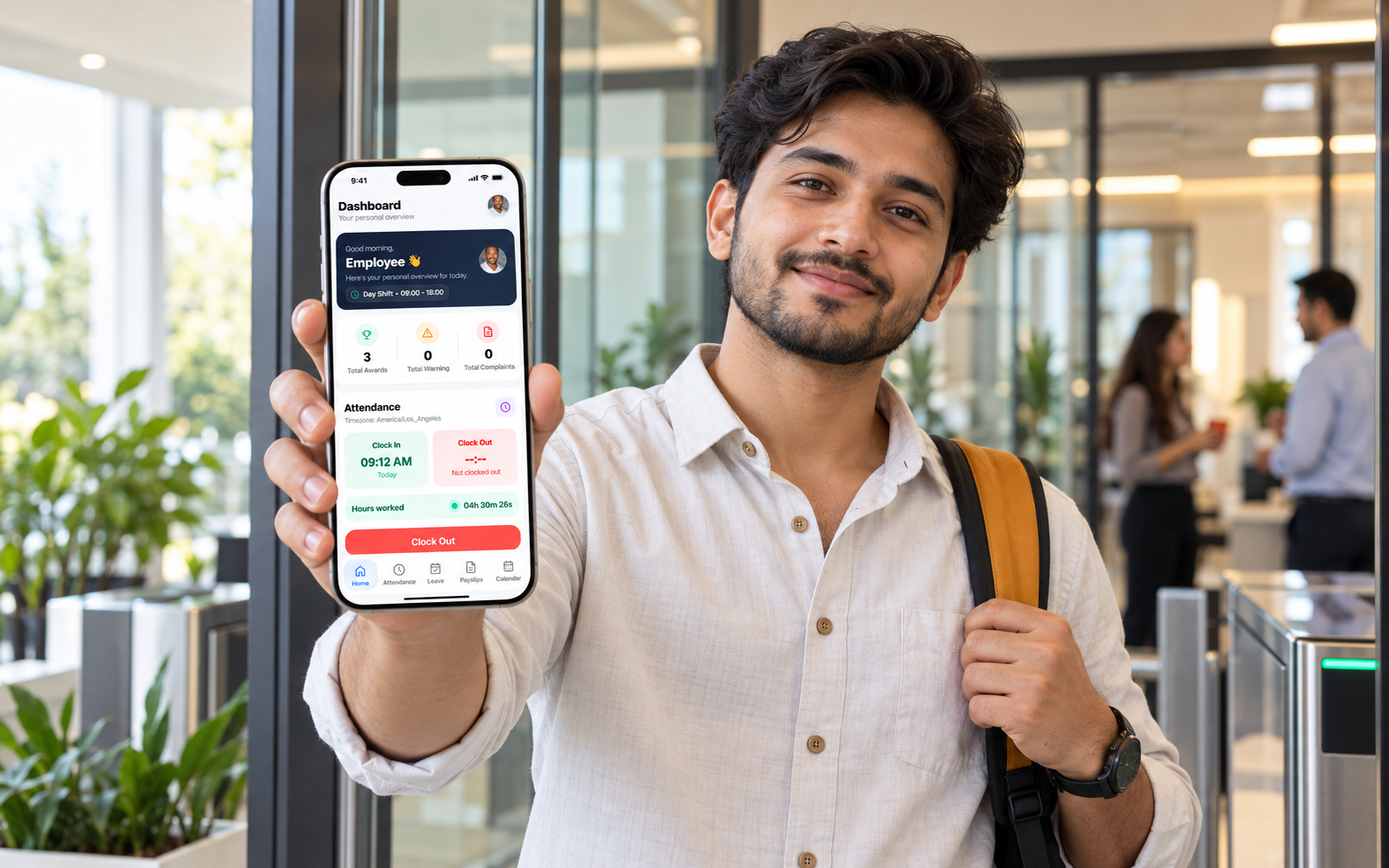 Employee clocking in with the HRM Mobile App at work