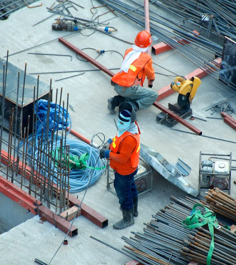 Construction safety manager inspecting jobsite compliance
