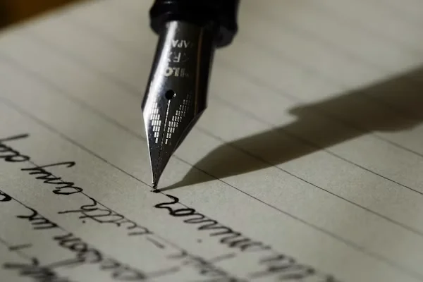 Fountain pen signing official legal certificates and notary documentation